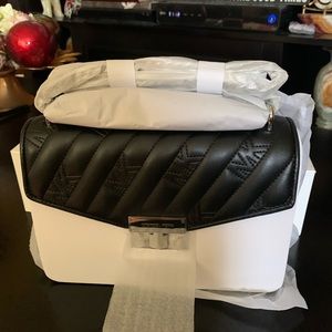Michael Kors black handbag never used.